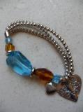 Bracelet billes m�tal argent�  et perle turquoise.