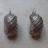 Boucles d'oreilles allong�es en m�tal argent�.