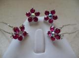 Epingles cheveux fleurs strass rose.